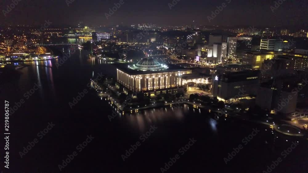 Unique night lights Aerial Putrajaya mosque Malaysia KL Kuala Lumpur. Beautiful Islam Muslim modern architecture. Reflection in lake river. Drone flight high altitude cityscape Overall city life Unique night lights Aerial Putrajaya mosque Malaysia KL Kuala Lumpur. Beautiful Islam Muslim modern architecture. Reflection in lake river. Drone flight high altitude cityscape Overall city life