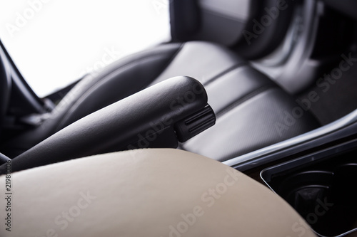 Black leather arm rest in SUV car