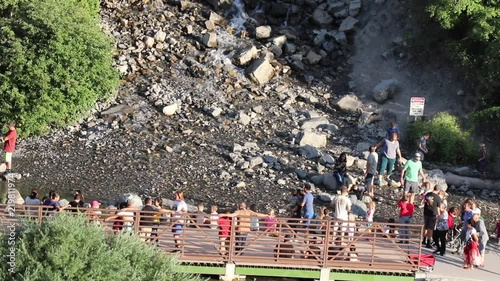 People at a waterfall