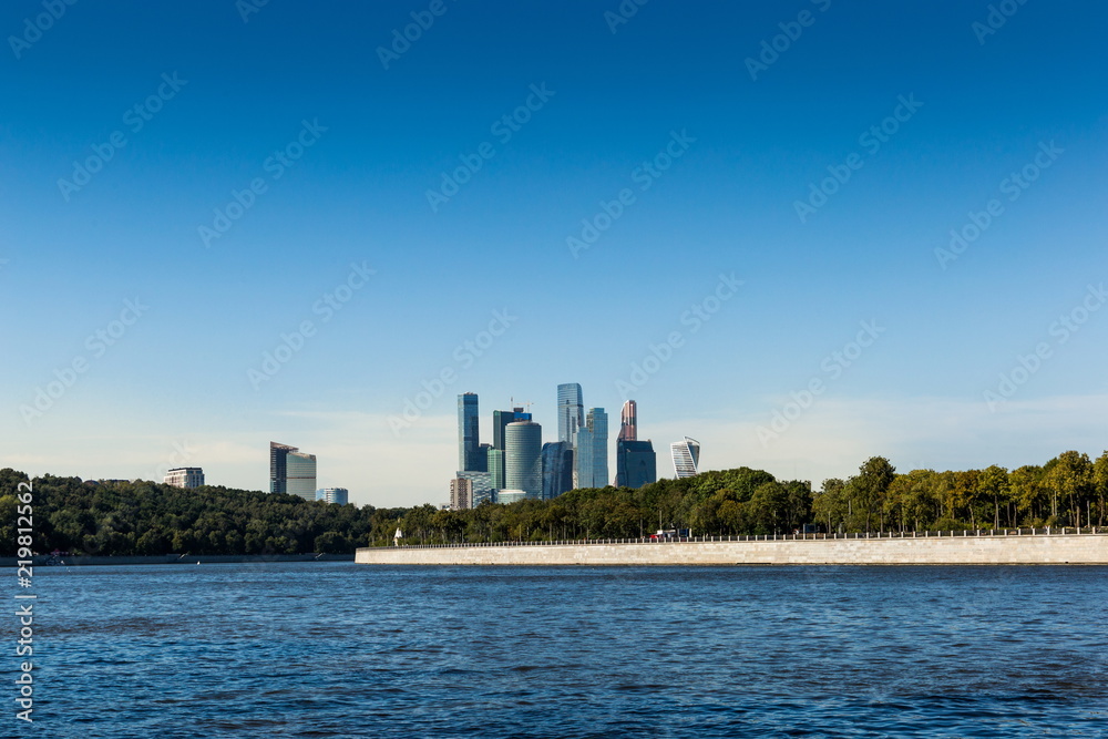 Moscow City skyline . Moscow International Business Centre at day time with Moskva river in foreground