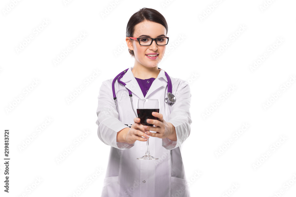 Young woman doctor with stethoscope offering wine in white uniform on white background Young woman doctor with stethoscope offering wine in white uniform on white background