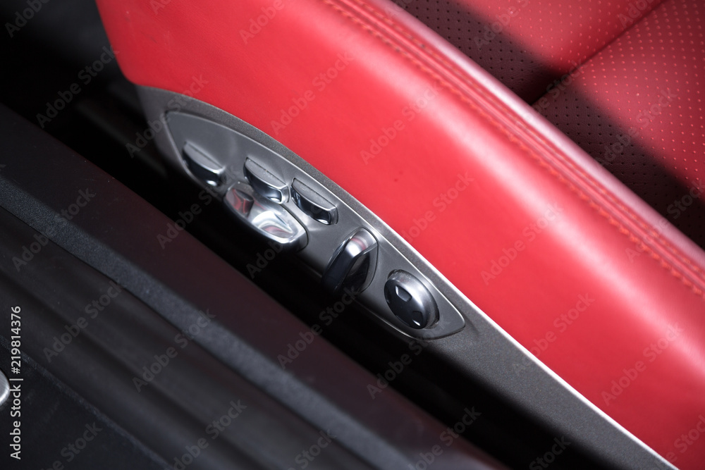 Electric red leather seat in sports car