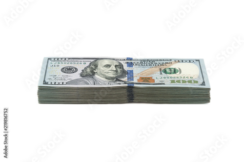 Ten thousand dollars in a pack of one hundred dollars. View at an angle. Isolated.