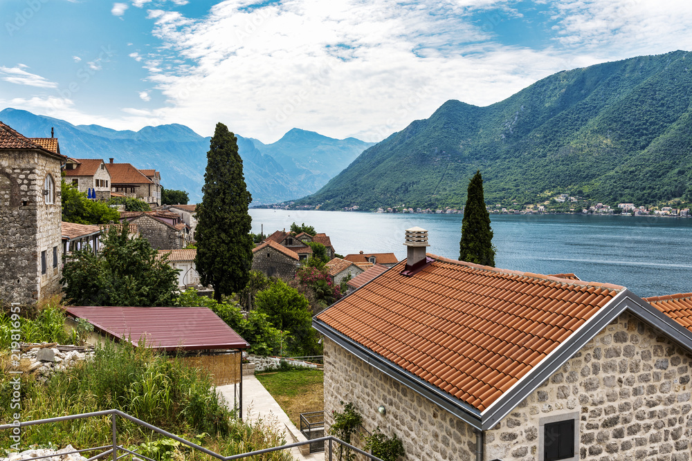 The beautiful village of Perast in Montenegro. Perast sits on the bay of Kotor on the Adriatic sea and lies a few miles north of Kotor.
