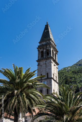 The bell tower of St Nicholas Church in Perast in Montenegro. Perast is a beautiful village that sits on the bay of Kotor on the adriatic sea.