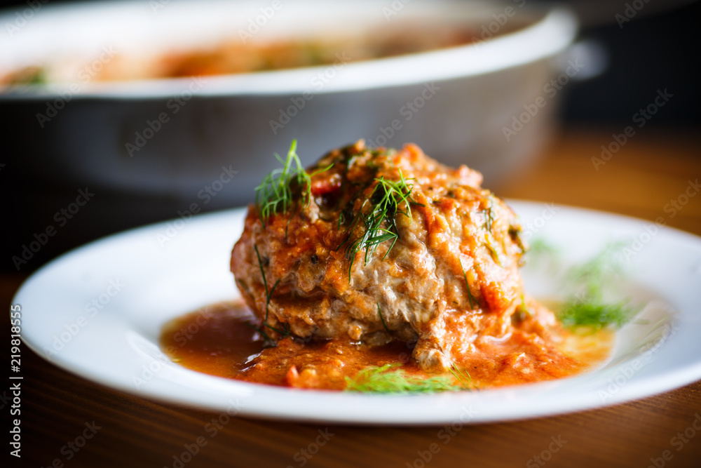 meatballs with tomato sauce on the table