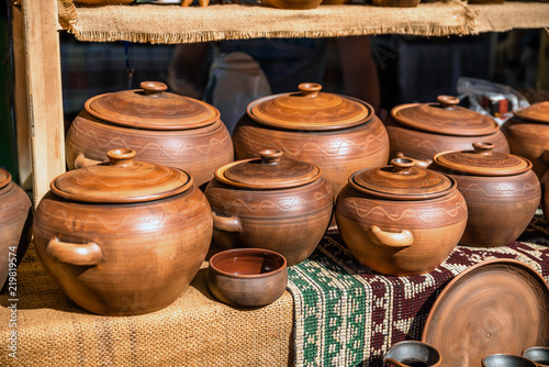 Clay dishes. Crockery made clay. Dishes background photo