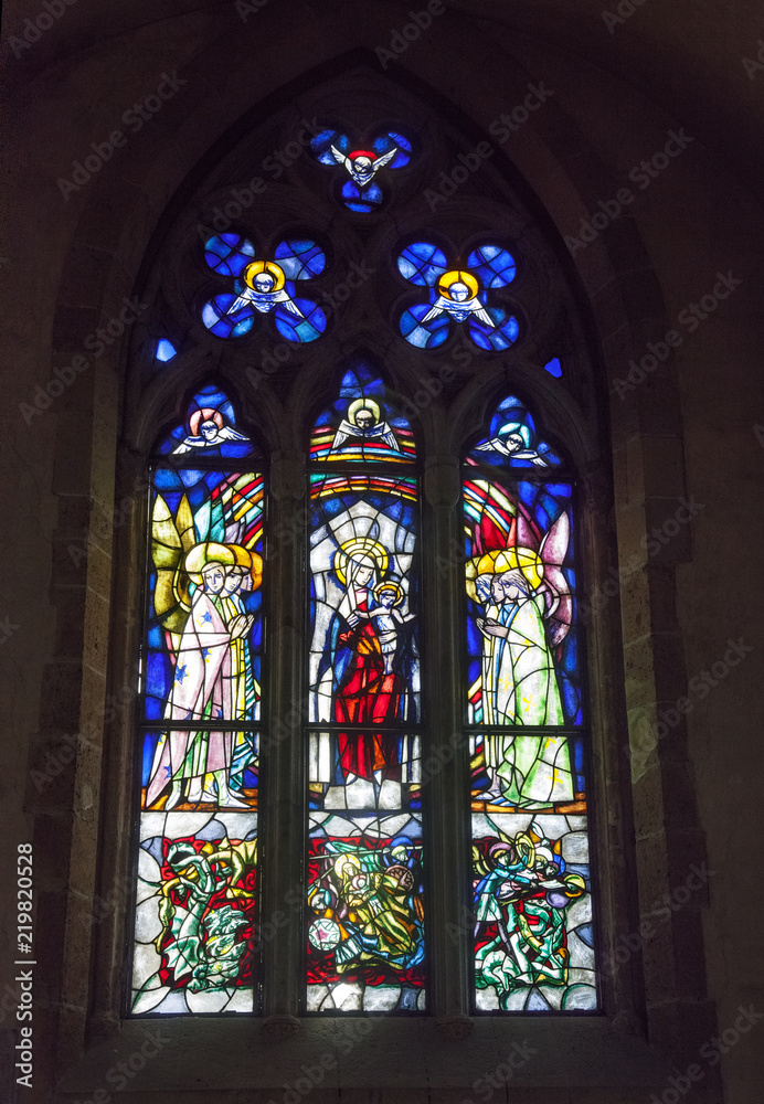 artistic stained glass depicting Madonna with Child Jesus - Church of the Monastery of Santa Chiara - Naples