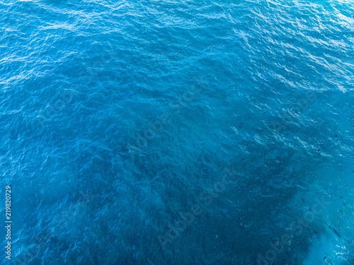 Deep Blue and green sea surface, top arial view © truekit