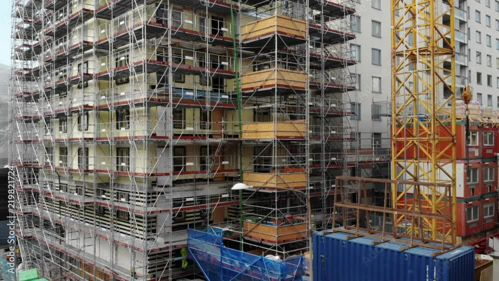 Aerial footage of a construction site / scaffolding in Stockholm, Sweden