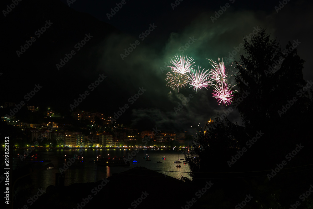 panoramic view of omegna during a fireworks display