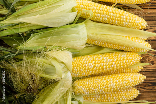 Pile of fresh yellow sweetcorn on the cob