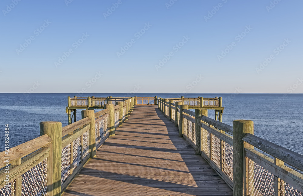 Pier boardwalk at sunset