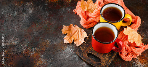 Enameled cup of hot tea