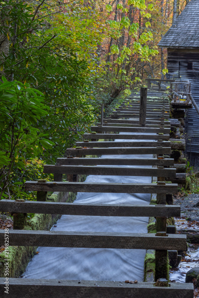 Wood sluice leading up to an old mill, Great Smoky Mountains, vertical aspect