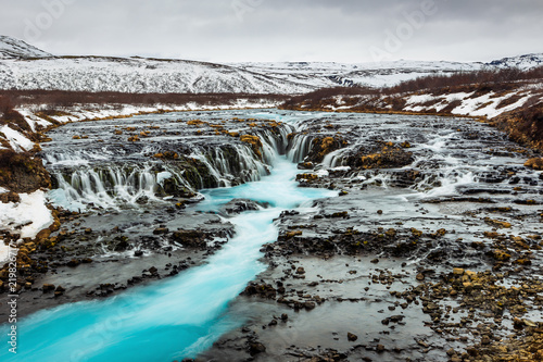 Secret Bruarfoss waterfall in winter Iceland