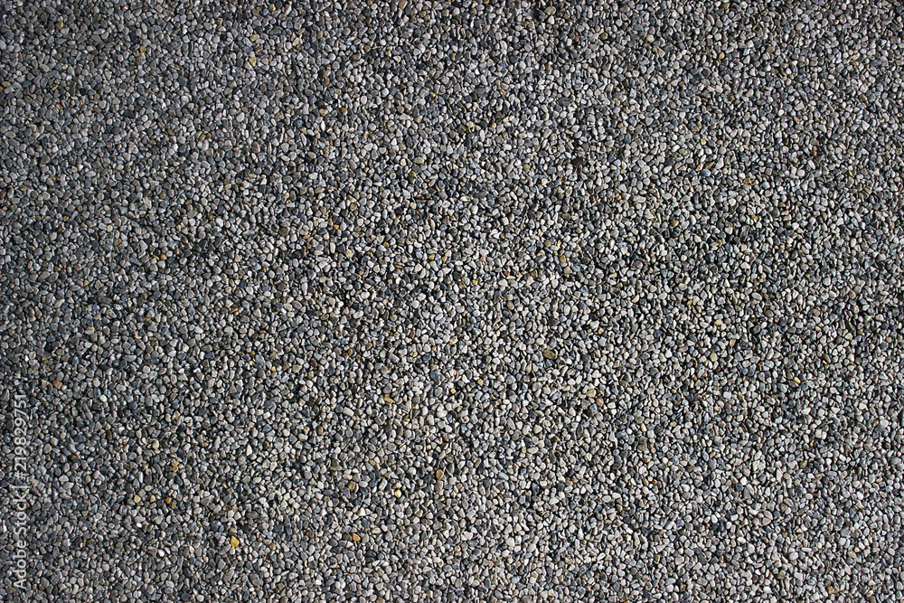 Small Rock Textured background. Seamless texture of gravel. crushed granite texture