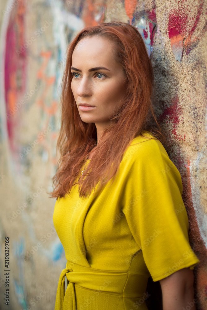 Redhead in a yellow dress Redhead in a yellow dress
