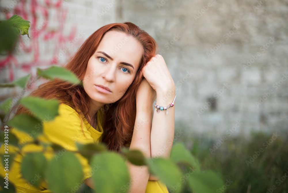 Redhead in a yellow dress Redhead in a yellow dress