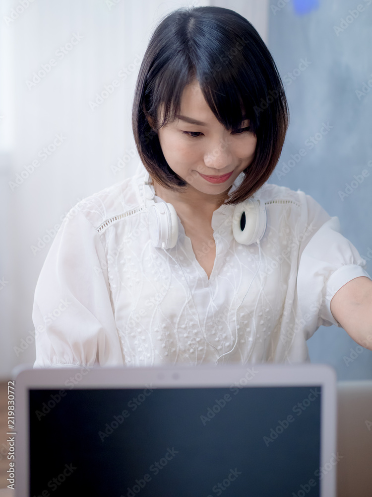 Young woman using laptop in cafe shop Young woman using laptop in cafe shop