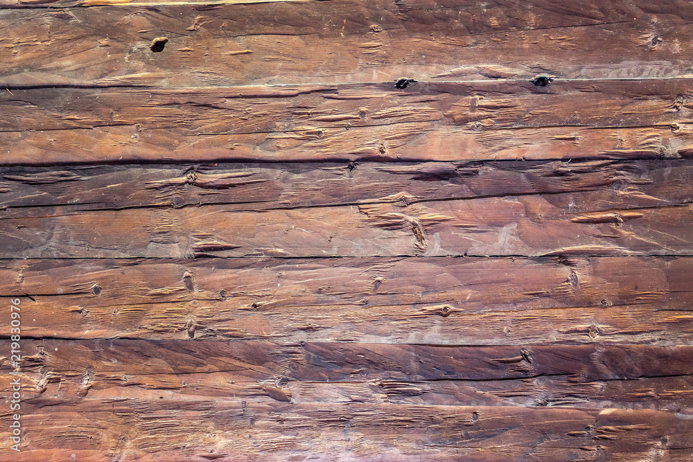 Naklejka premium Holz Hintergrund rustikal, Bretterwand aus warmen Holz