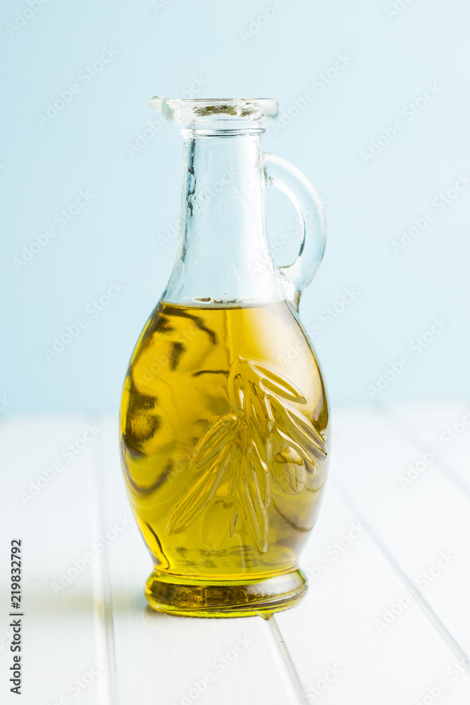 Olive oil in bottle.
