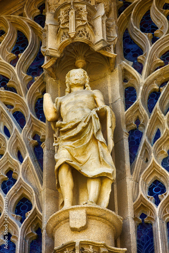 statue of hero and openwork ornament photo
