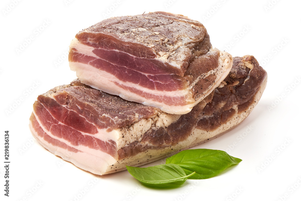 Smoked rustic farmer meat with basil leaves, isolated on white background. Smoked rustic farmer meat with basil leaves, isolated on white background.