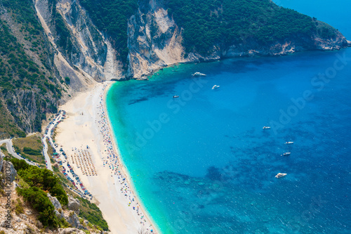 Aerial view of Myrtos beach in Kefalonia ionian island in Greece. One of the most famous beaches in the world with turquoise crystal clear sea waters  photo