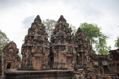 Ancient temple Banteay Srei view, Angkor Wat, Cambodia. Stone carved decor on hindu temple. Cambodian place of interest. © Elya.Q