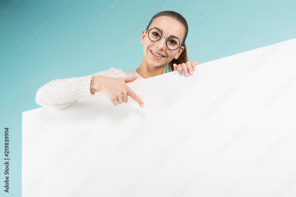 Attractive young woman with blank banner Attractive young woman with blank banner