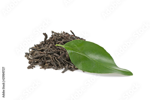 pile of tea and green tea leaf on white background