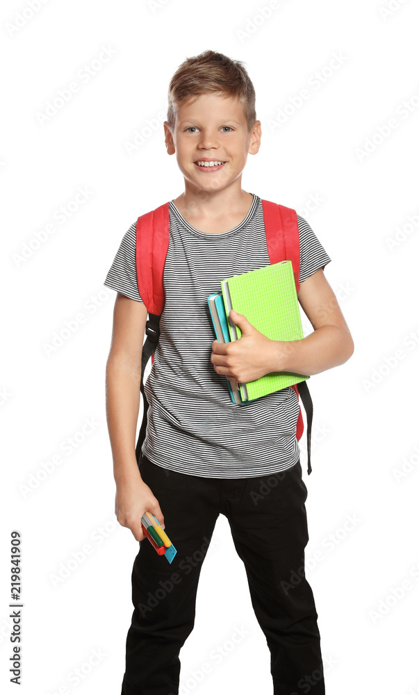 Cute boy with school stationery on white background Cute boy with school stationery on white background