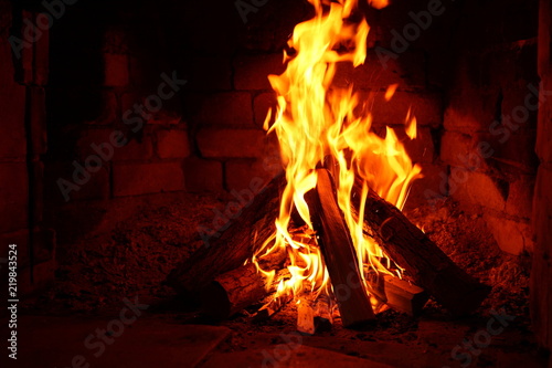 fire in a brick fireplace  fire in a brick fireplace  flames are inflaming
