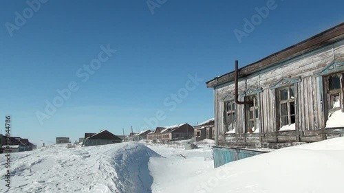 Abandoned house ghost town of Gudym Anadyr-1 Chukotka of far north of Russia. Unique place for stalkers. photo