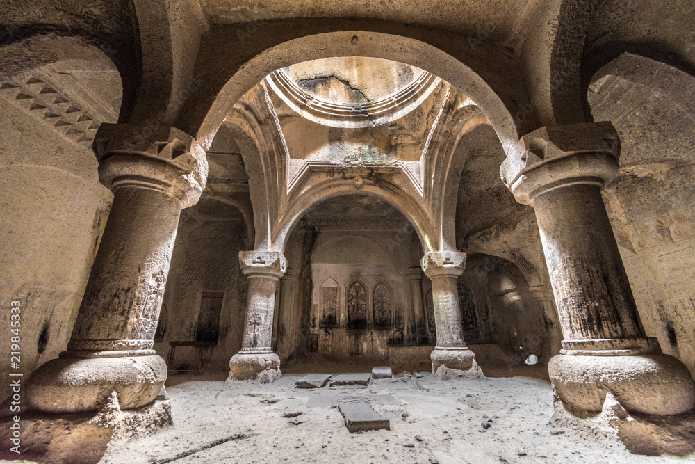 Geghard monastery interior cave chapel, Unesco heritage, Kotayk, Armenia - obrazy, fototapety, plakaty 