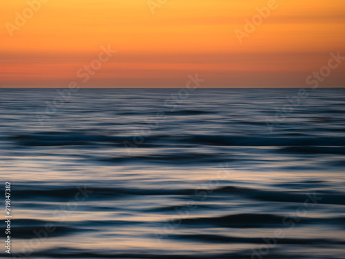 Abstract waves in motion at sunset © Jens Deppner