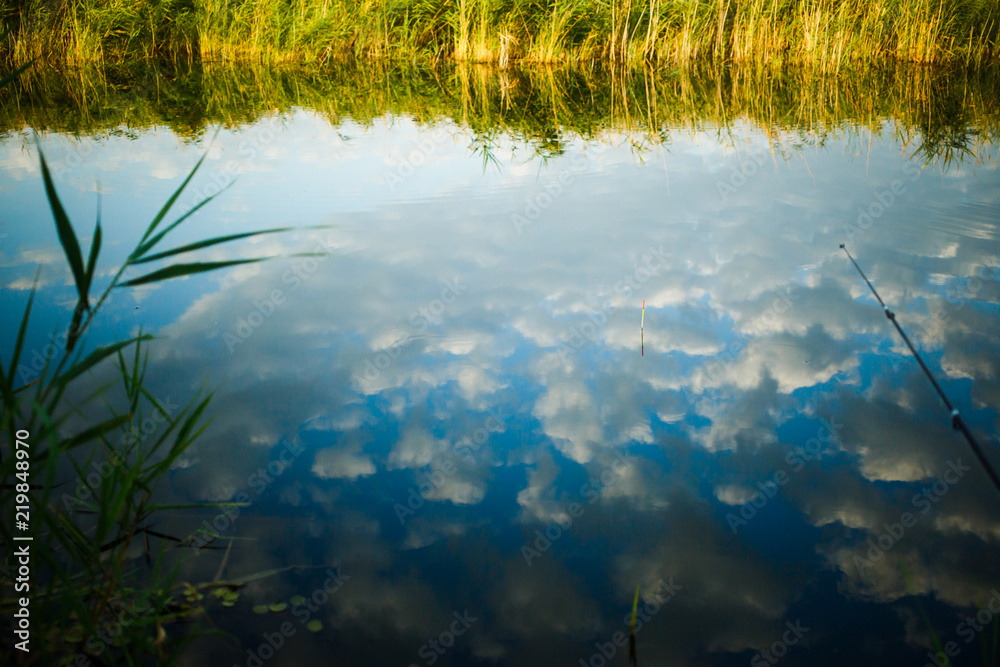 Fototapeta premium Clouds reflected in the lake.