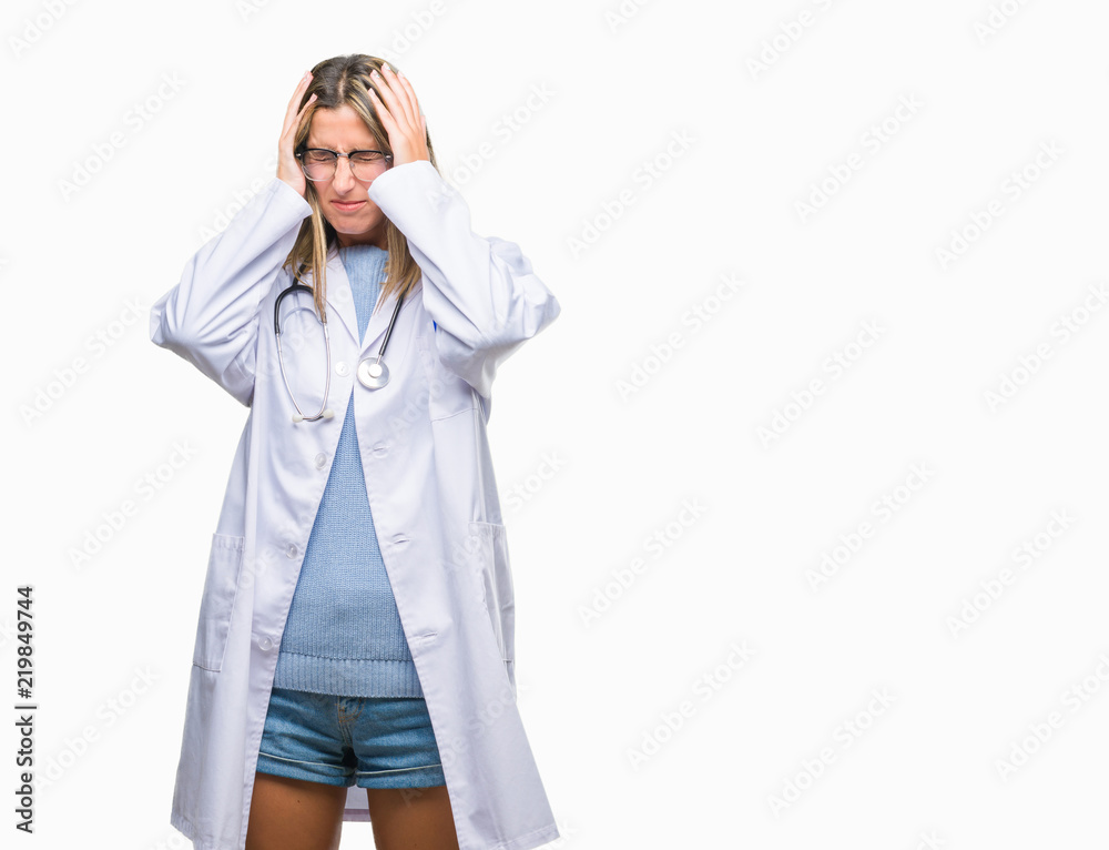 Young beautiful doctor woman headphones over isolated background suffering from headache desperate and stressed because pain and migraine. Hands on head. Young beautiful doctor woman headphones over isolated background suffering from headache desperate and stressed because pain and migraine. Hands on head.