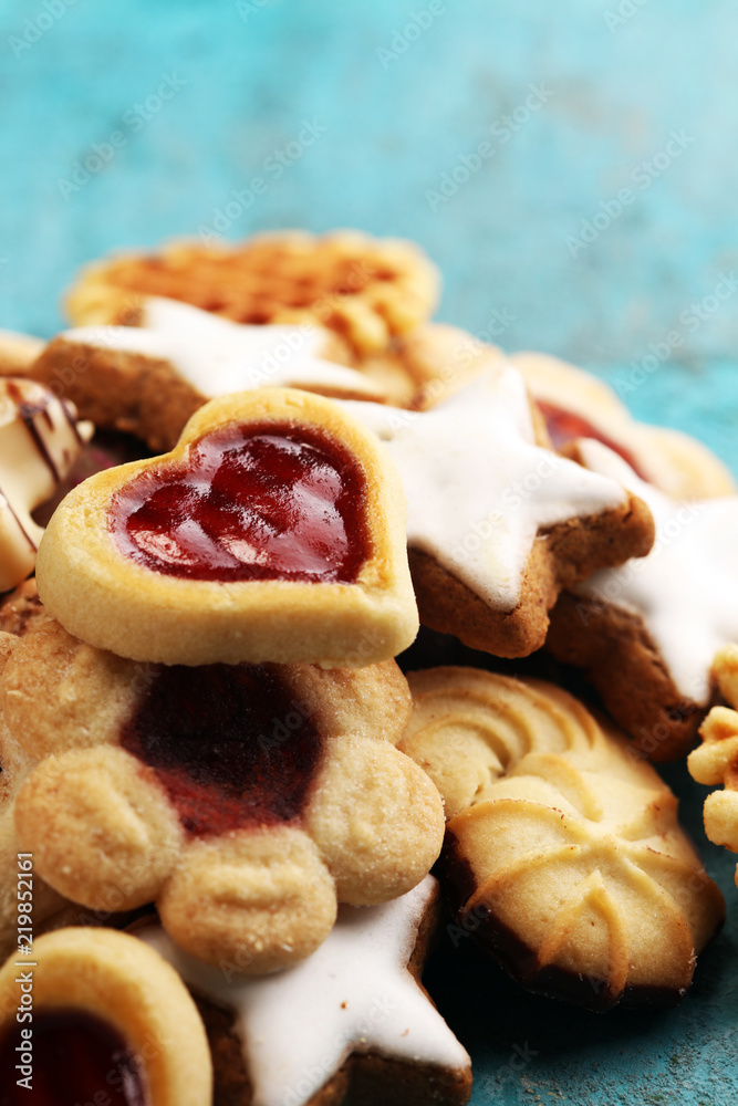 Mixed Christmas cookies. Colorful mix of Christmas-themed decorated cookies