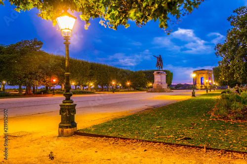 Sunset view of La Promenade du Peyrou dominated by the statue of king Louis XIV in Montpellier, France photo