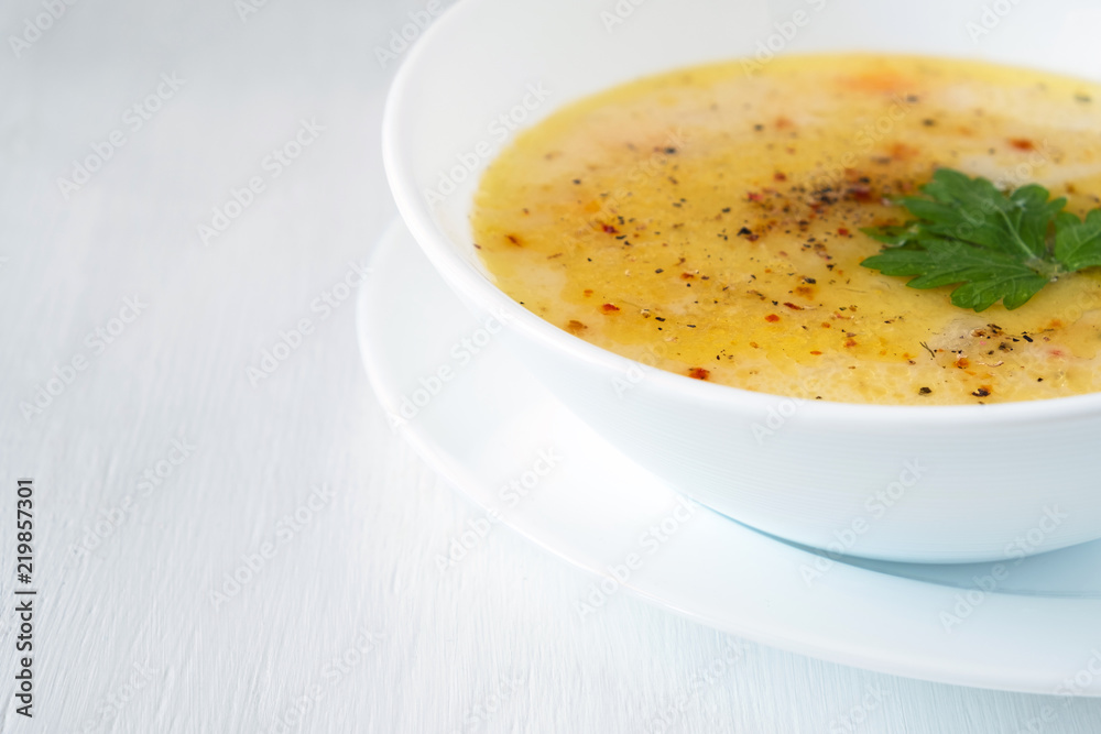 bowls of vegetable soup puree with cheese and seasonings, copy space bowls of vegetable soup puree with cheese and seasonings, copy space