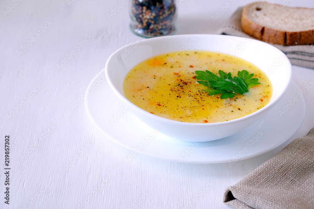 bowls of vegetable soup puree with cheese and seasonings, copy space bowls of vegetable soup puree with cheese and seasonings, copy space