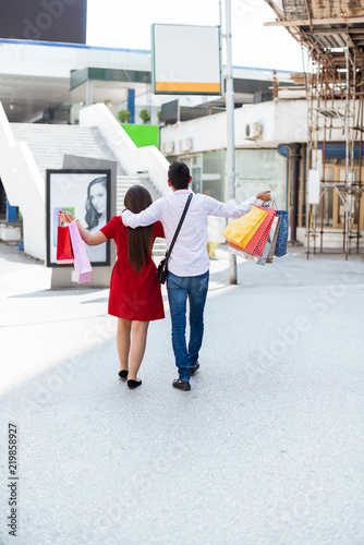 Couple shopping and walking together