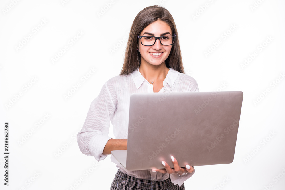 Young happy business woman holding laptop isolated on white background Young happy business woman holding laptop isolated on white background