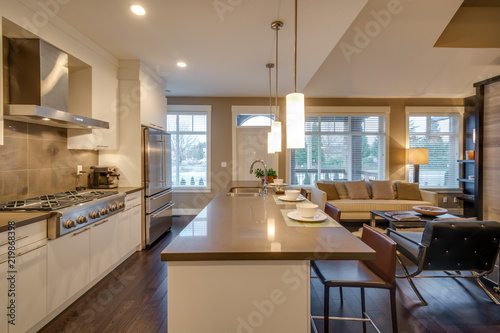 Modern  bright  kitchen and living room in a luxury house. Interior design.