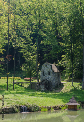 Old water mill in the park Schonborn in the Voyevodyno, Ukraine