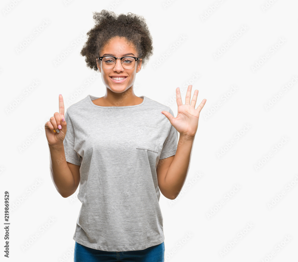 Young afro american woman wearing glasses over isolated background showing and pointing up with fingers number six while smiling confident and happy. Young afro american woman wearing glasses over isolated background showing and pointing up with fingers number six while smiling confident and happy.