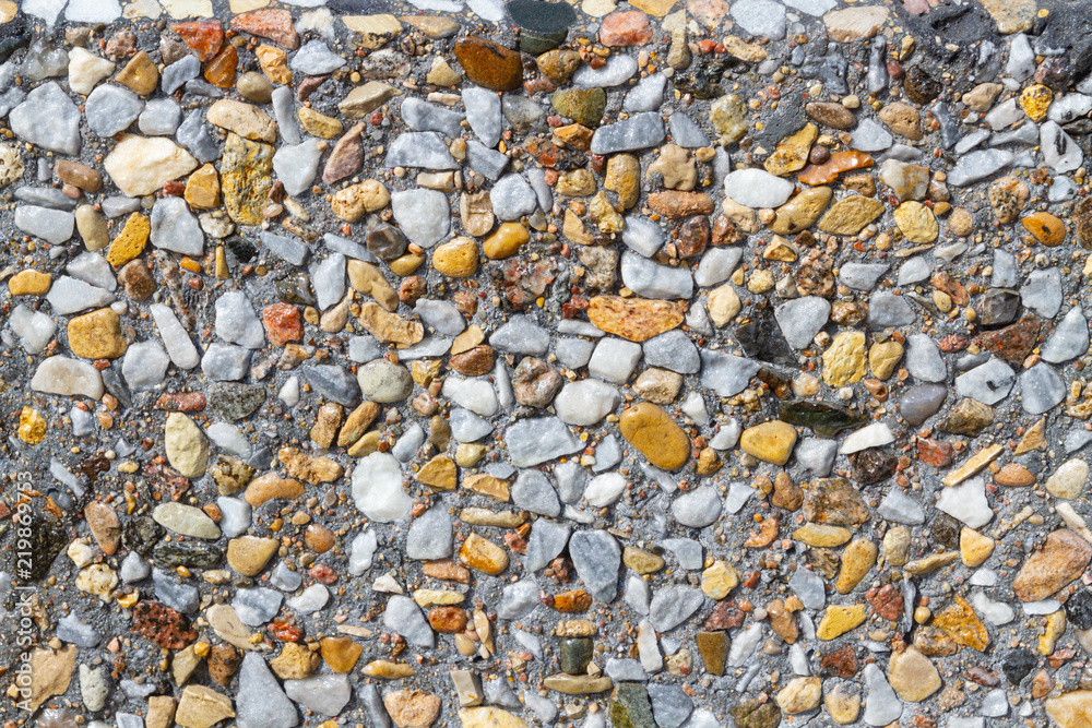 Wall of small colored stone made of cement Wall of small colored stone made of cement