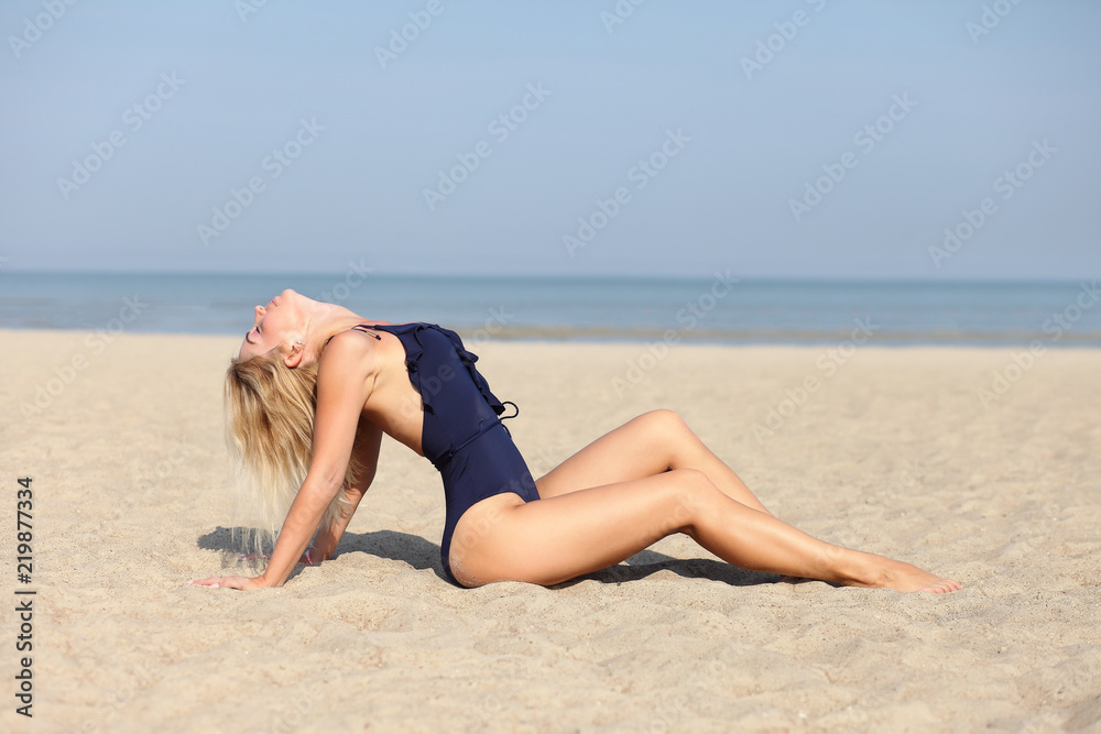 female enjoying sunny day on beach female enjoying sunny day on beach